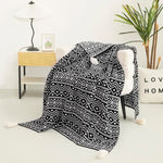 Couverture canapé en tricot - Vignette | Couvertures Cosy