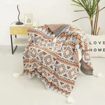 Couverture canapé en tricot - Vignette | Couvertures Cosy