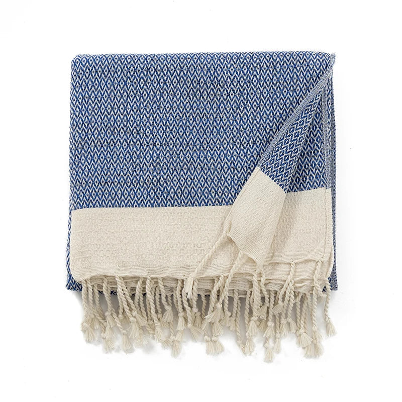 Couverture en coton turc avec pompons décoratifs