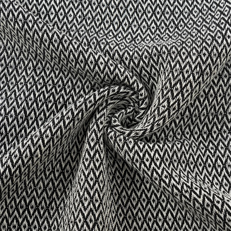 Couverture en coton turc avec pompons décoratifs