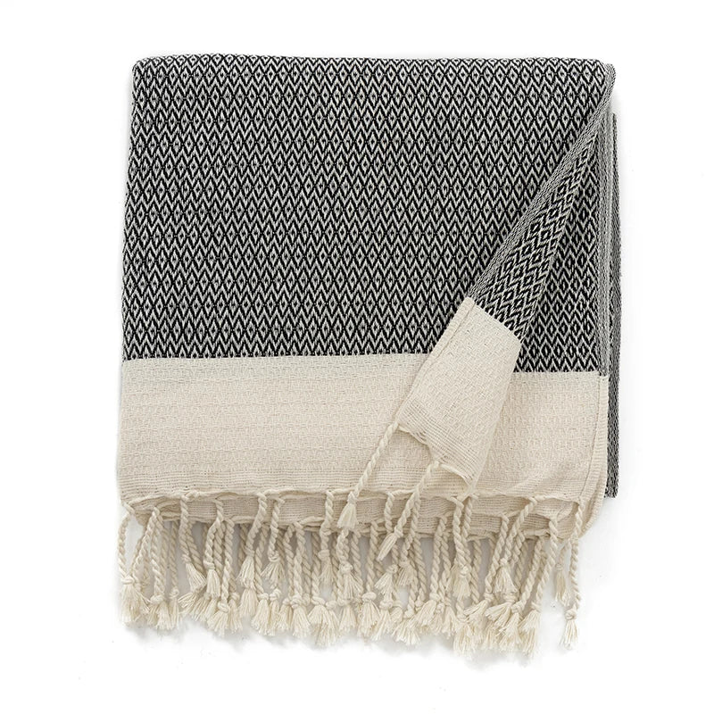 Couverture en coton turc avec pompons décoratifs