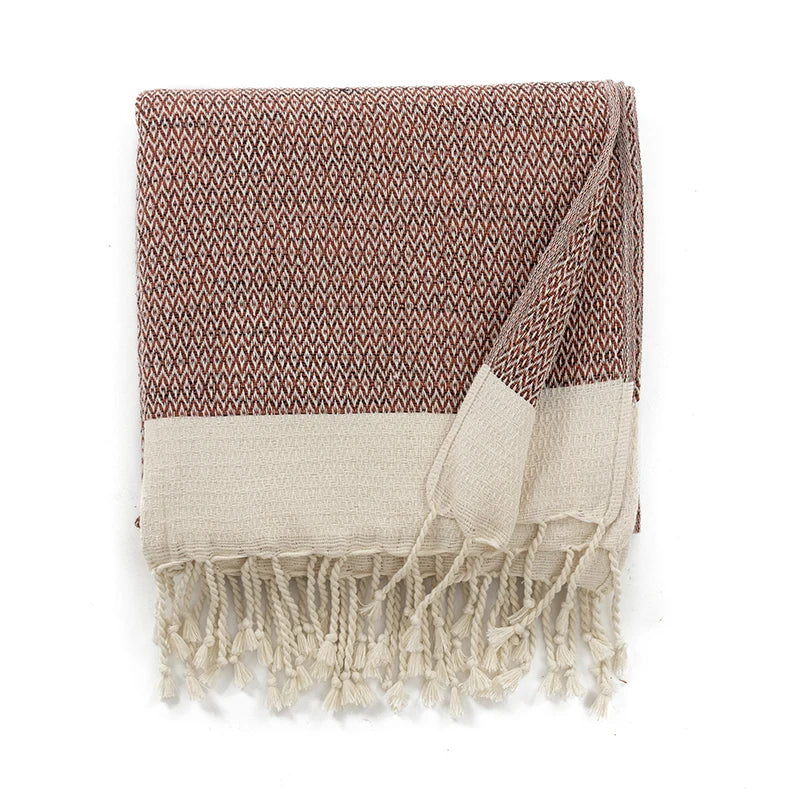 Couverture en coton turc avec pompons décoratifs