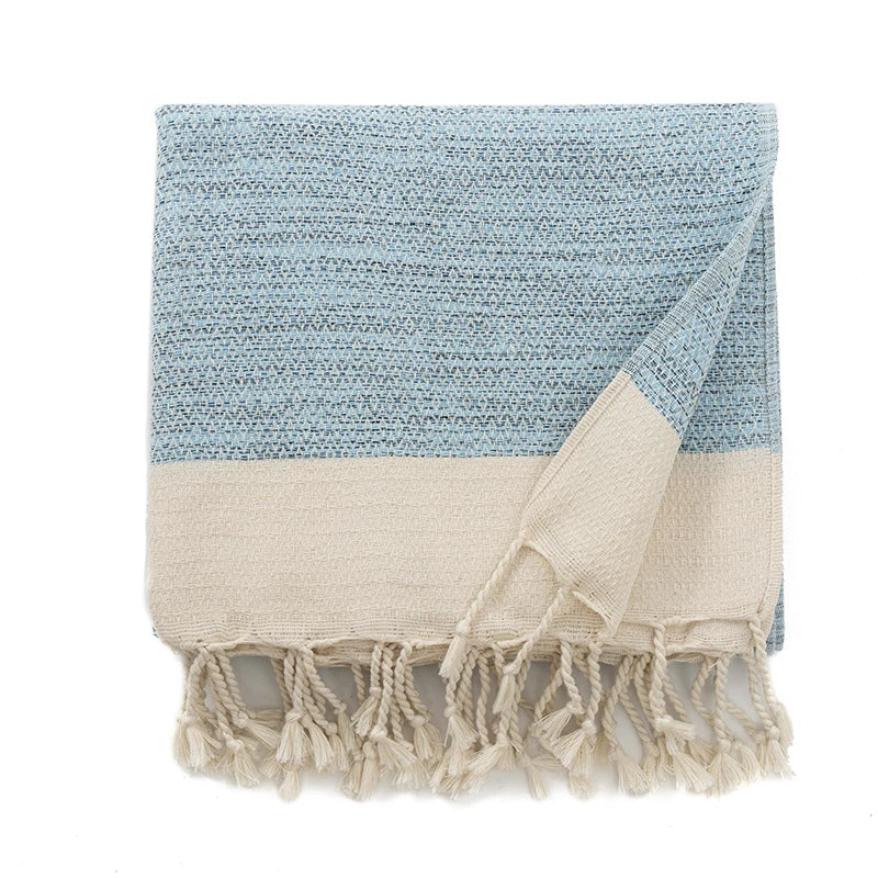 Couverture en coton turc avec pompons décoratifs