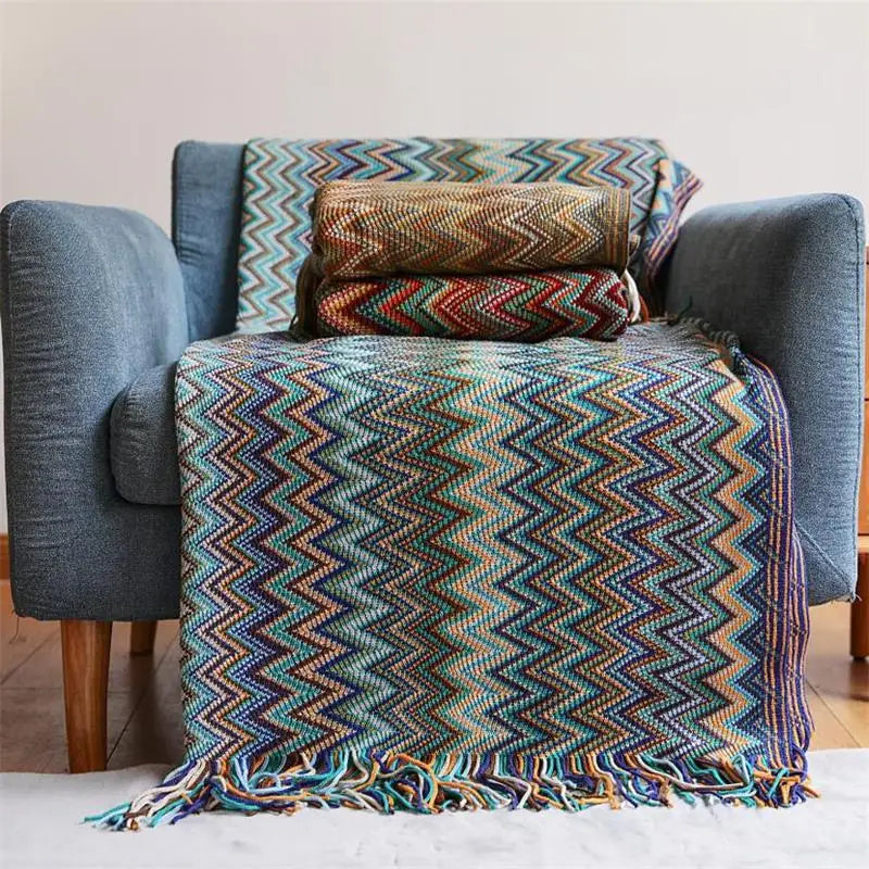 Couverture tricotée à la main avec pompon