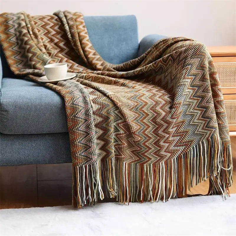 Couverture tricotée à la main avec pompon