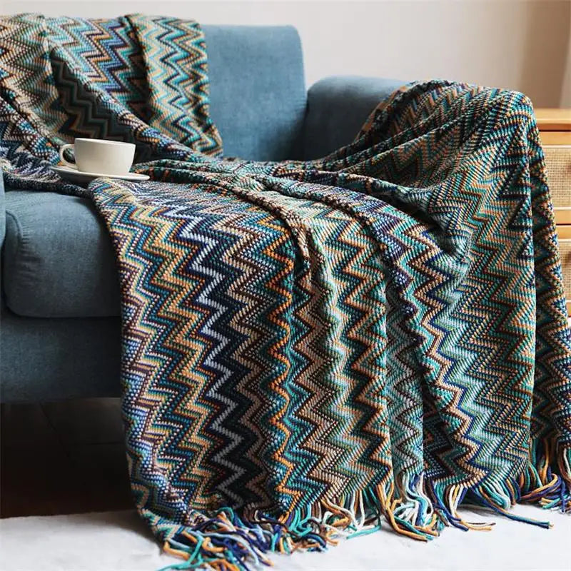 Couverture tricotée à la main avec pompon