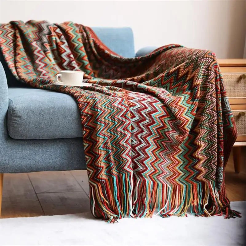 Couverture tricotée à la main avec pompon